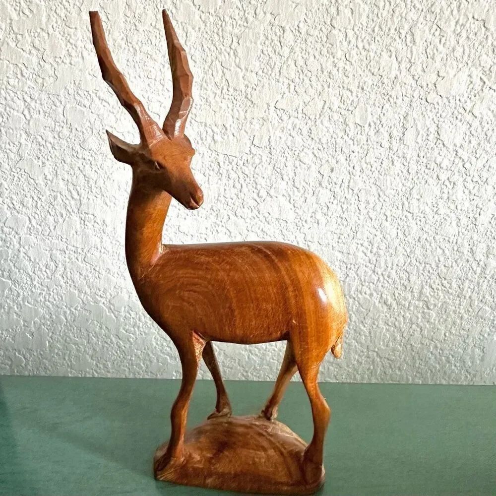 Vintage wooden hand carved deer sculpture